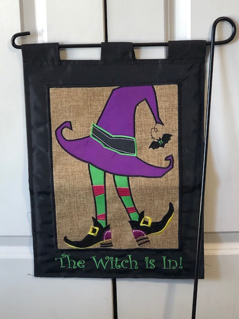 The Witch is in garden flag!